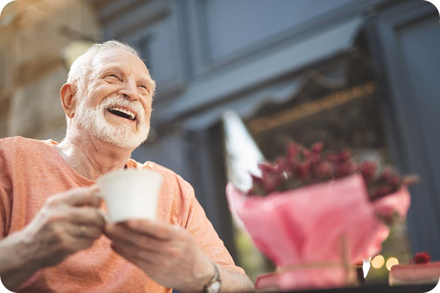 Man smiling with mug